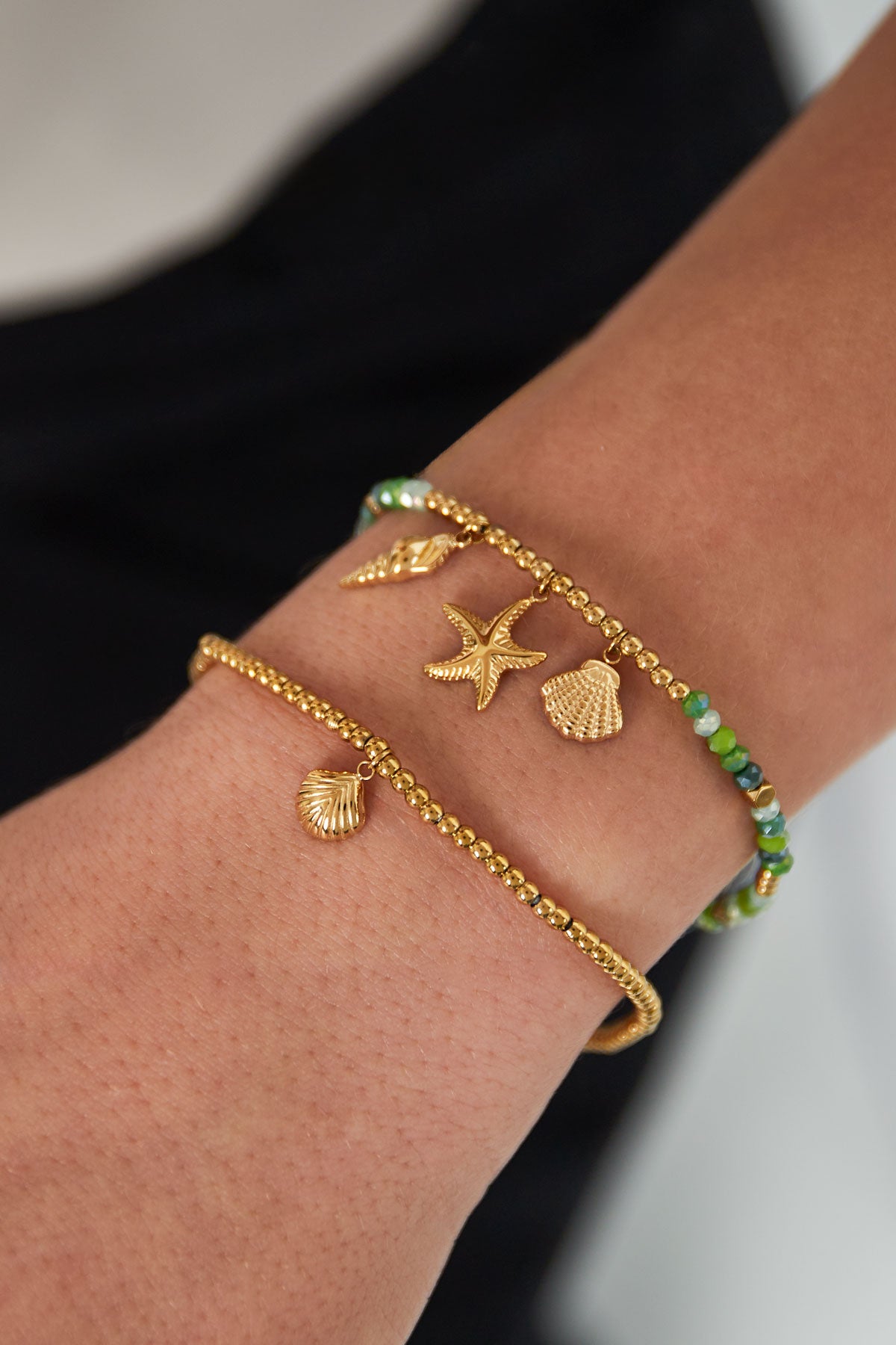 Schlichtes Armband mit kleiner Muschel - Goldfarben