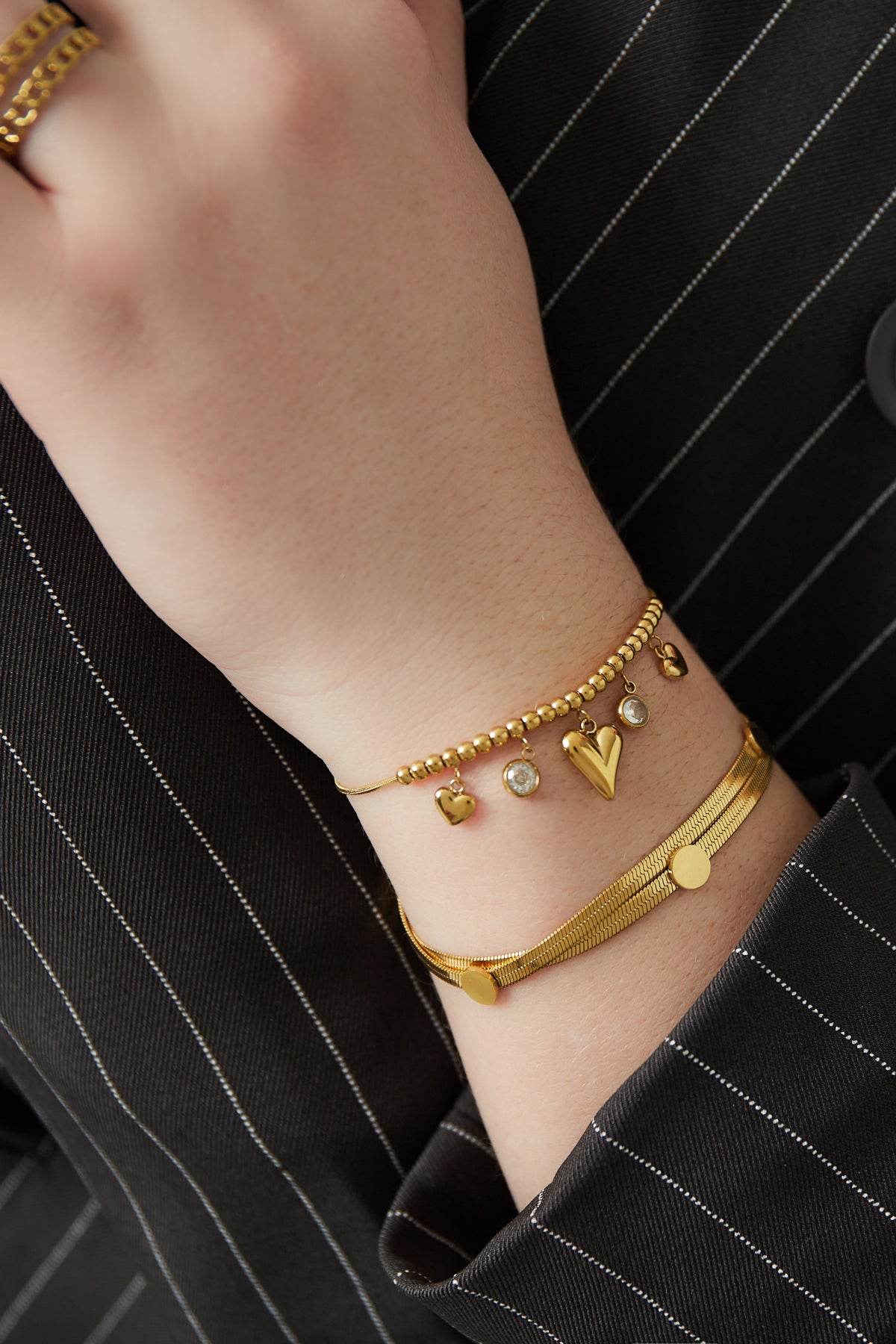 Schimmerndes Herzarmband - Goldfarben