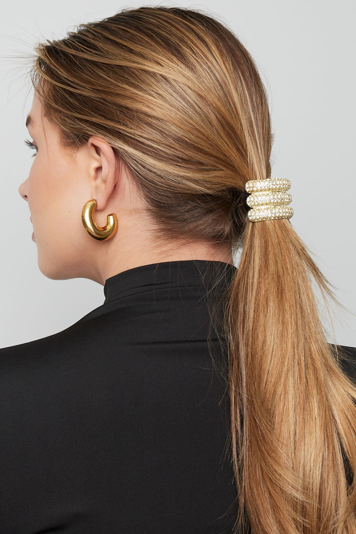 Elegantes leuchtendes Haargummi - Goldfarben